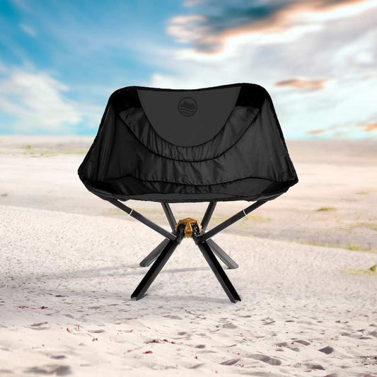 Cliq chair against beach dunes at sunset